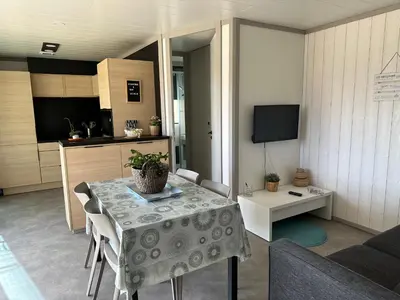 Télévision ou salle de divertissement dans l'établissement Cottage parc résidentiel de loisir