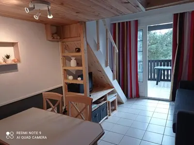 Coin salon dans l'établissement Duplex entre forêt et océan - Chez Alex & Max