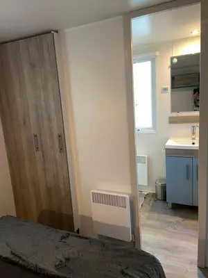 Cuisine ou kitchenette dans l'établissement Mobilhome 516