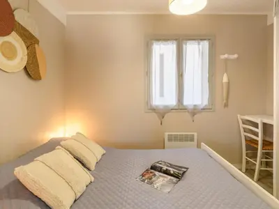 Un ou plusieurs lits dans un hébergement de l'établissement Apartment Bleuet by Interhome