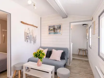 Coin salon dans l'établissement Apartment Bleuet by Interhome