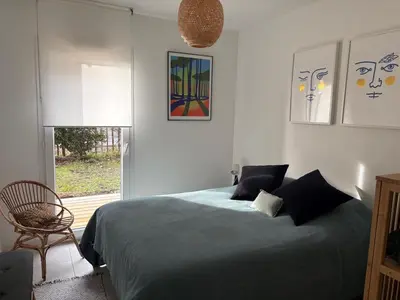 Un ou plusieurs lits dans un hébergement de l'établissement Superbe appartement neuf, 2 terrasses , jardin