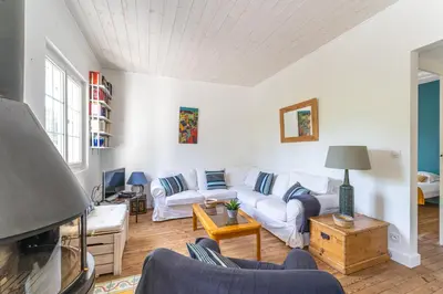 Coin salon dans l'établissement Villa Amandine - Charmante maison de famille au Pyla
