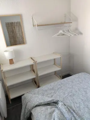 Un ou plusieurs lits dans un hébergement de l'établissement Appartement rénové au Penon