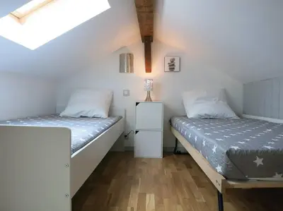 Un ou plusieurs lits dans un hébergement de l'établissement Gîte O 3 Cèdres