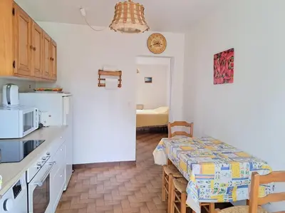 Cuisine ou kitchenette dans l'établissement COLIBRI