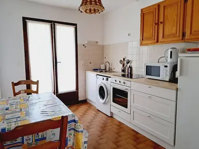 Cuisine ou kitchenette dans l'établissement COLIBRI