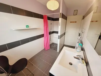 Salle de bains dans l'établissement La Rose des Vents