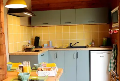 Cuisine ou kitchenette dans l'établissement Le Hameau Secret