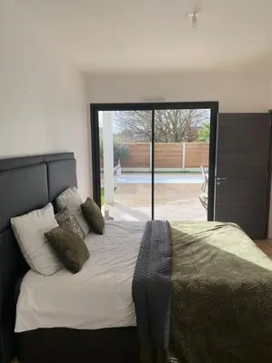 Un ou plusieurs lits dans un hébergement de l'établissement Villa Luxe Exclusive avec Piscine Privée
