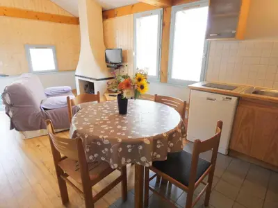 Cuisine ou kitchenette dans l'établissement Gite bleu