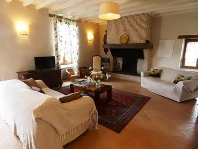 Télévision ou salle de divertissement dans l'établissement Maison abelia
