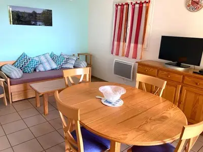 Télévision ou salle de divertissement dans l'établissement Chalosse