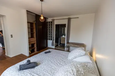 Un ou plusieurs lits dans un hébergement de l'établissement La villa de saint lon