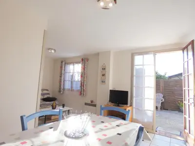 Télévision ou salle de divertissement dans l'établissement Gite des pignons