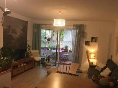 Coin salon dans l'établissement Charmant appartement 42m2 pour location de vacances Seignosse