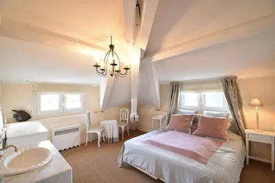 Un ou plusieurs lits dans un hébergement de l'établissement Embruns - Location vacances capbreton superbe villa avec jardin et piscine chauffée