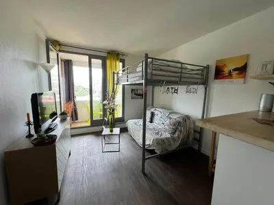 Un ou plusieurs lits dans un hébergement de l'établissement Studio 212 lumineux à deux pas de l'océan