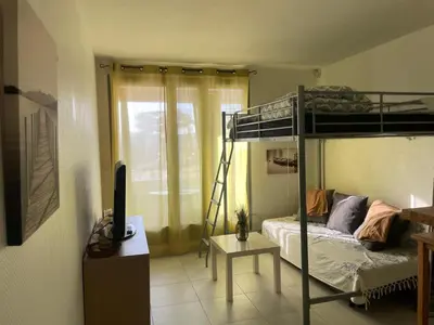 Un ou plusieurs lits dans un hébergement de l'établissement Studio 212 lumineux à deux pas de l'océan
