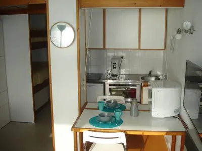 Cuisine ou kitchenette dans l'établissement Hossegor Appartement T2 cabine - Superbe Vue Océan