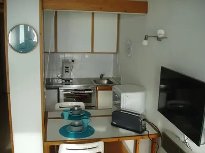 Cuisine ou kitchenette dans l'établissement Hossegor Appartement T2 cabine - Superbe Vue Océan