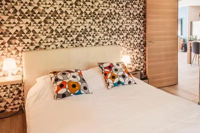 Un ou plusieurs lits dans un hébergement de l'établissement VILLA DREAM LANDES Piscine tempérée-Jacuzzi-5 suites parentales