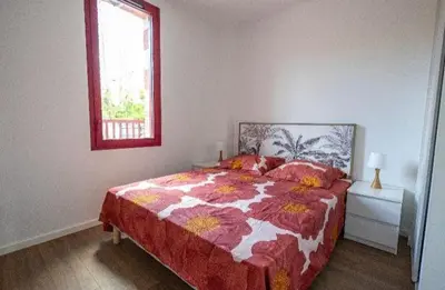 Un ou plusieurs lits dans un hébergement de l'établissement Appartement proche du lac centre ville