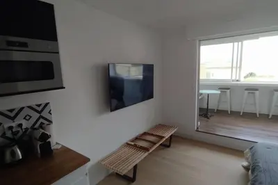 Télévision ou salle de divertissement dans l'établissement La Junior Suite