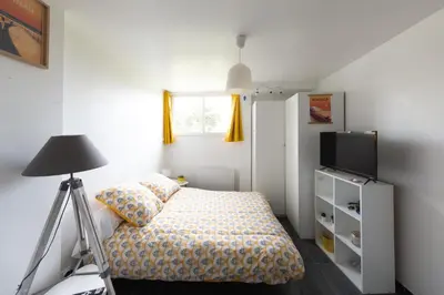 Un ou plusieurs lits dans un hébergement de l'établissement Dune Front Paradise - Appartement sur la dune