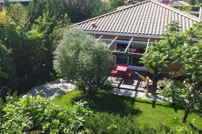 Jardin de l'établissement BEACH HOUSE DE CHARME A MESSANGES. LA MAISON BLEUE