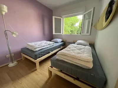 Un ou plusieurs lits dans un hébergement de l'établissement Maison Duplex T4 6 couchages