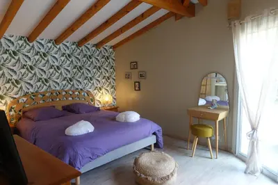 Un ou plusieurs lits dans un hébergement de l'établissement VILLA CLASSEE 3 ETOILES, PISCINE CHAUFEE 9X4, A 500M DE LA PLAGE SURVEILLEE