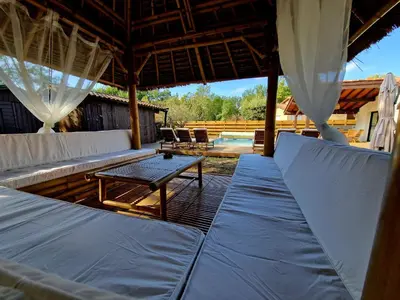 Balcon ou terrasse dans l'établissement Villa 12 personnes proche oécan, 10 vélos et 4 surf fournis, entièrement climatisée