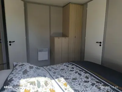 Un ou plusieurs lits dans un hébergement de l'établissement cottage familial piscine dans les Landes