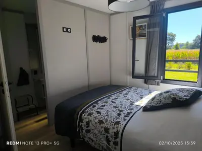 Un ou plusieurs lits dans un hébergement de l'établissement cottage familial piscine dans les Landes