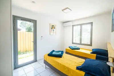 Un ou plusieurs lits dans un hébergement de l'établissement un Air de Repos