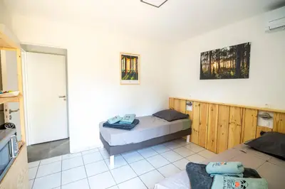 Coin salon dans l'établissement un Air de Repos