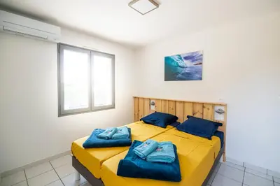 Un ou plusieurs lits dans un hébergement de l'établissement un Air de Repos