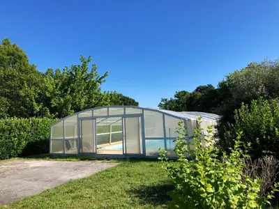 Jardin de l'établissement Maison avec Piscine à Pontenx-les-Forges
