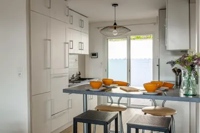Cuisine ou kitchenette dans l'établissement Villa Marie - Pyla sur mer superbe villa 10 personnes vue Bassin