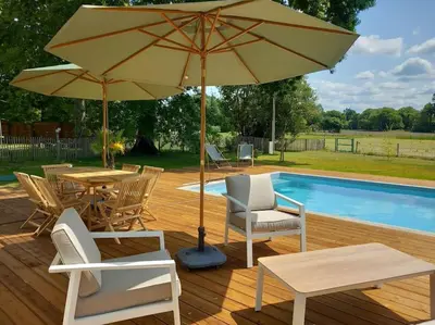 Piscine de l'établissement Maison neuve avec piscine chauffée, 4 kms de Contis plage ou située à proximité