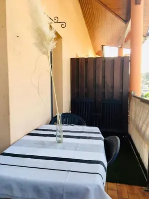 Un ou plusieurs lits dans un hébergement de l'établissement - Appartement Cauris -
