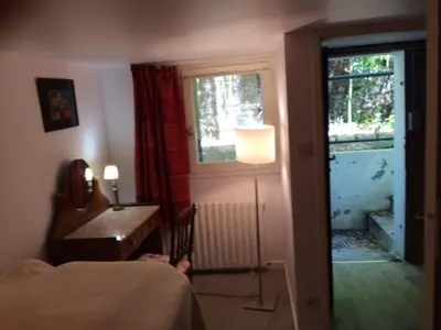 Un ou plusieurs lits dans un hébergement de l'établissement Villa Surprise