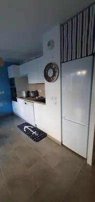 Cuisine ou kitchenette dans l'établissement Appartement Centre de La Teste