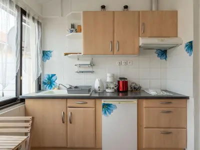 Cuisine ou kitchenette dans l'établissement Appartement pour 3 à Mimizan Plage, à 50m de l'océan avec terrasse et parking, ménage inclus - FR-1-50-123