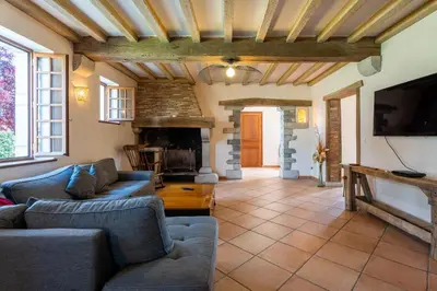 Coin salon dans l'établissement Lou Grith - Maison pour 10 avec piscine privée