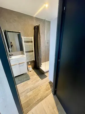 Salle de bains dans l'établissement Appartement - location saisonnière