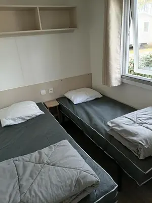 Un ou plusieurs lits dans un hébergement de l'établissement les Dunes de Contis