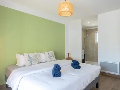 Un ou plusieurs lits dans un hébergement de l'établissement Holiday Home Ocean forest by Interhome