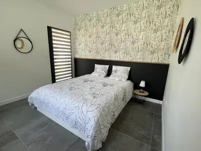 Un ou plusieurs lits dans un hébergement de l'établissement Salles, Maison à 30 min d'Arcachon